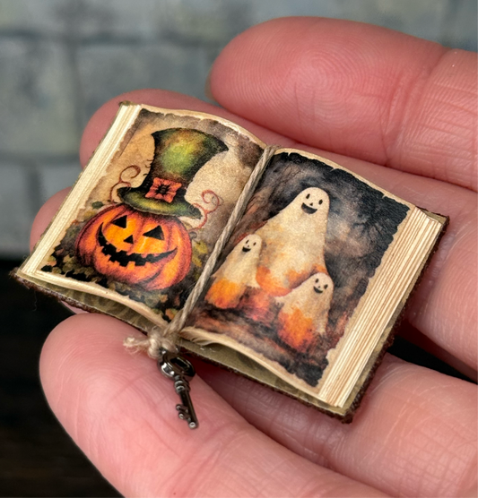 Jack-o-Lantern in top hat with ghost family Open Book - 1:12 Scale