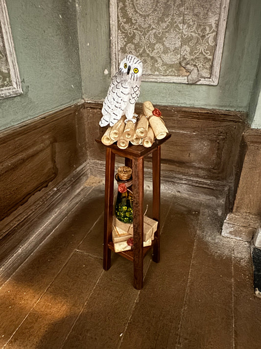 Snowy Owl on Scrolls Atop a Plant Stand With a Potion and Packages - 1:12 Scale